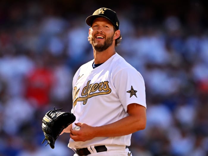 Jul 19, 2022; Los Angeles, California, USA; National League starting pitcher Clayton Kershaw (22) of the Los Angeles Dodgers smiles on the mound in the first inning against the American League at Dodger Stadium.